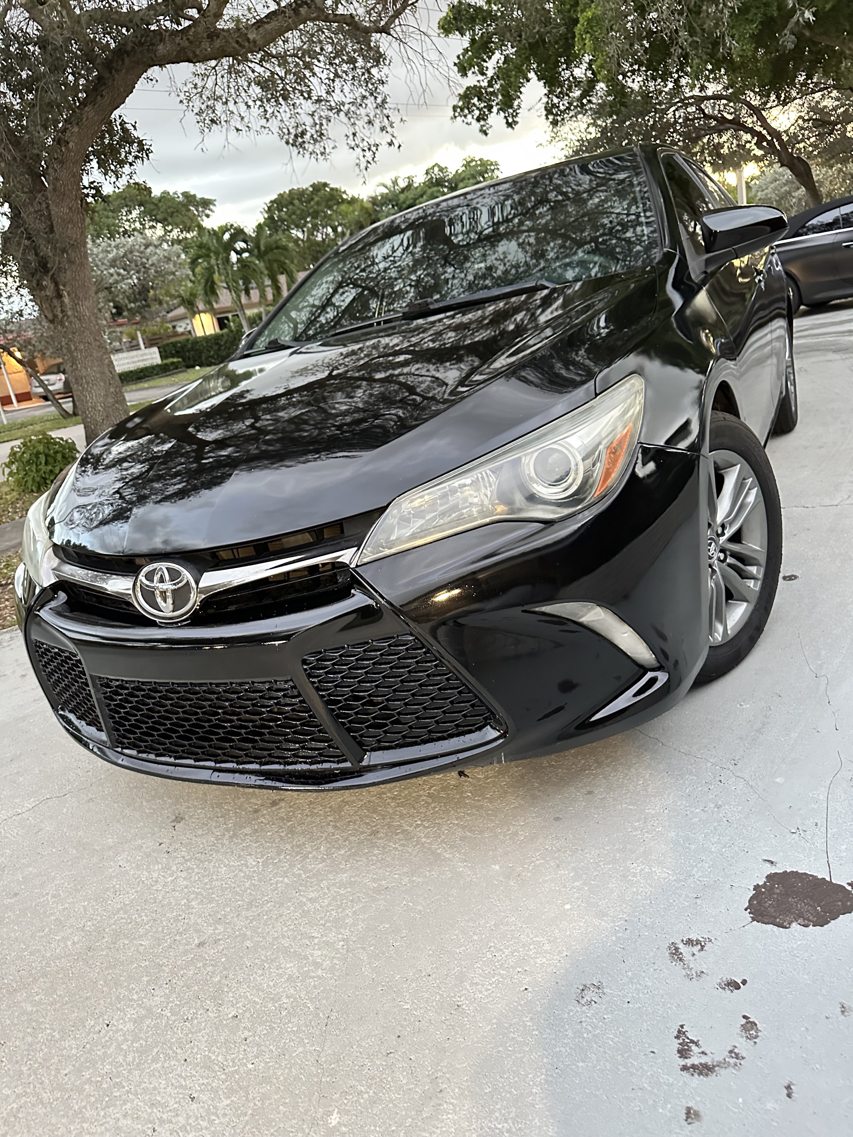 Black Toyota Camry economy rental